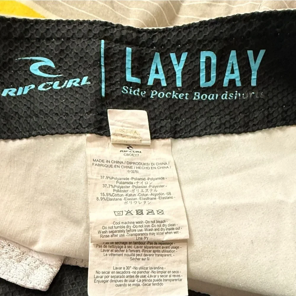 Rip Curl Gray, Blue & Yellow Striped Board Shorts
